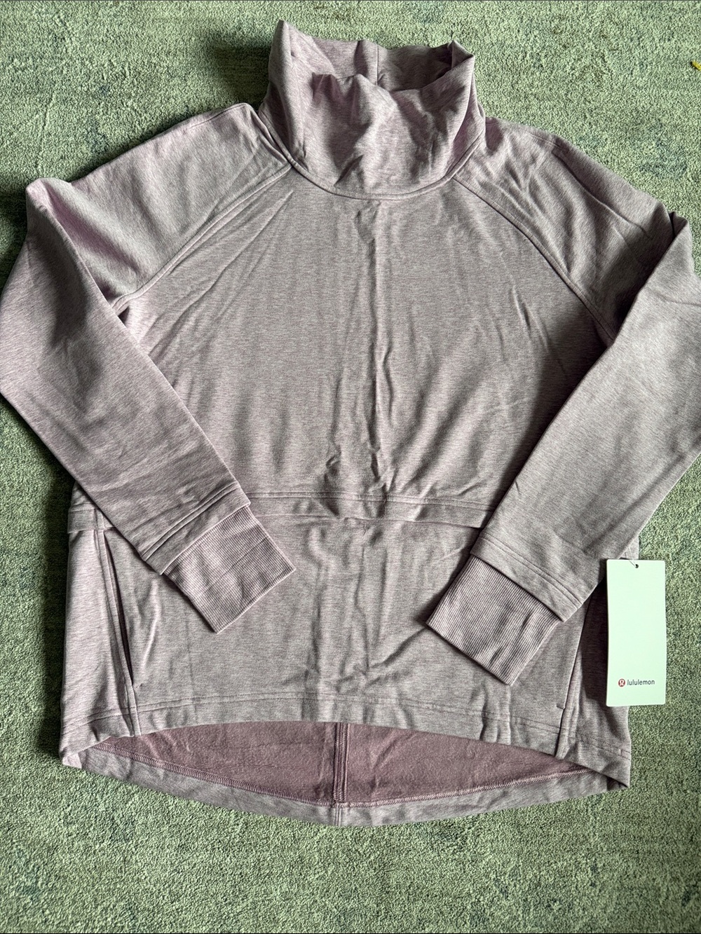 Women’s Lululemon Find your Unwind Pullover 
Size 8
Color heathered pink